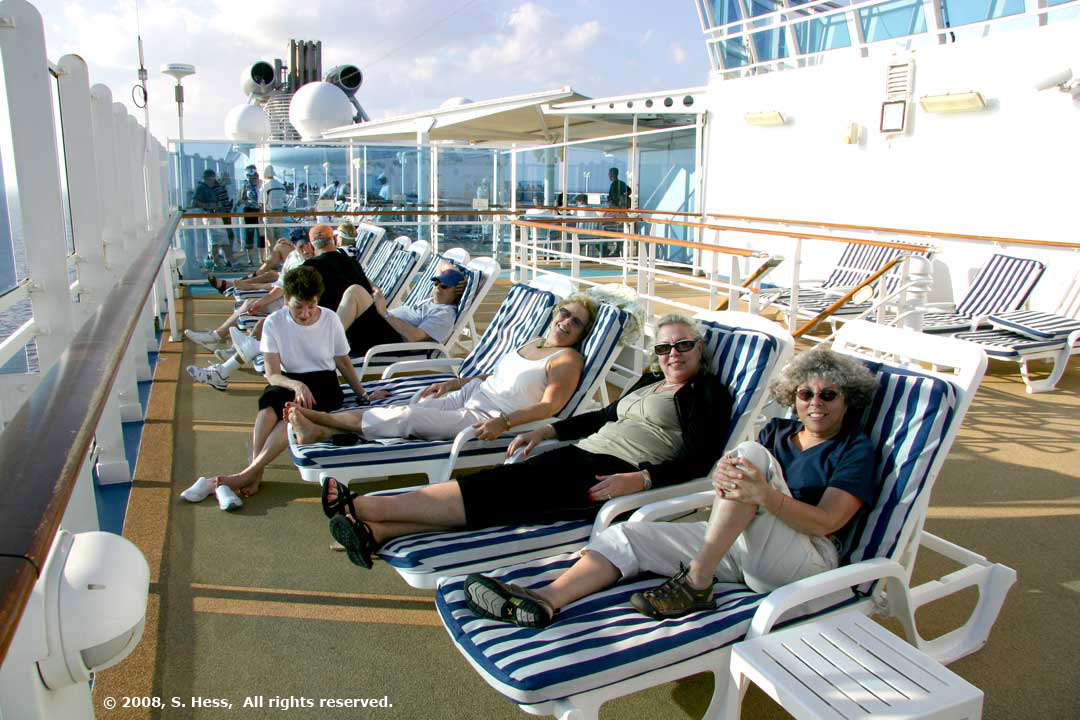 group relaxing on deck